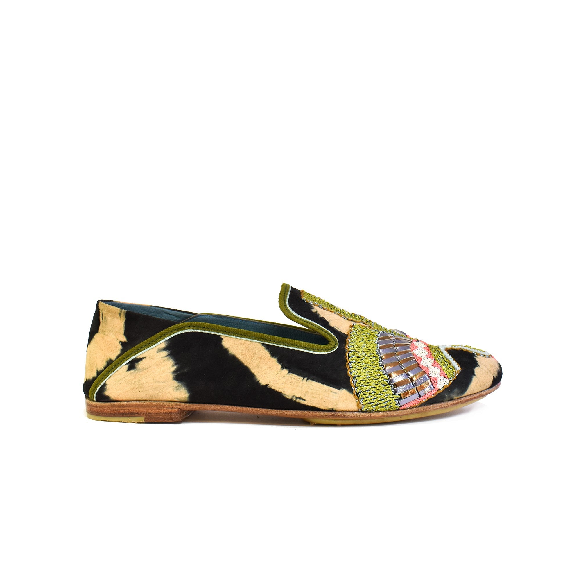 Side view of all leather Moccasin in black beige tie-dye suede leather with olive trim and embroidered vamp motif