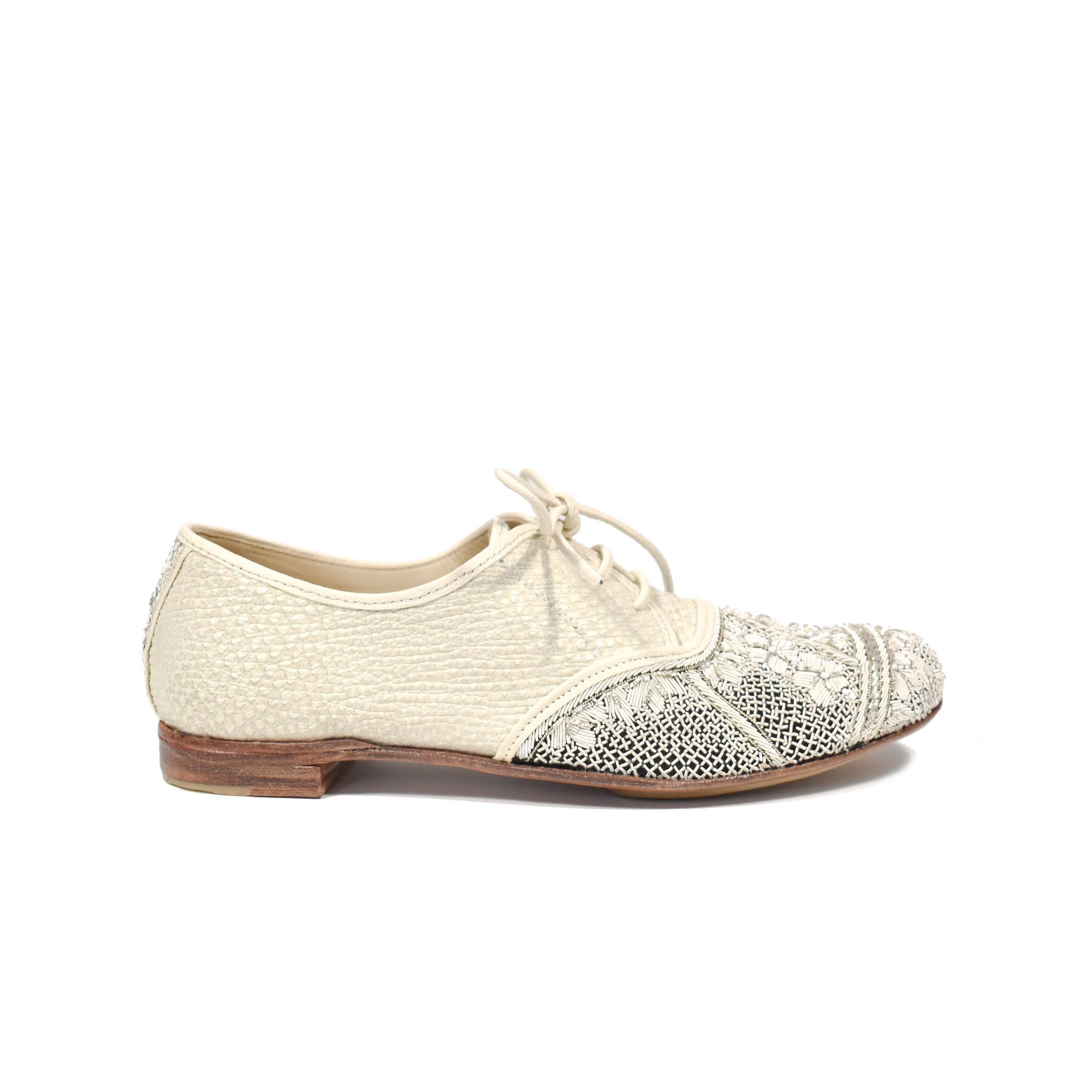 White Meher Kakalia brogues with delicate embroidery, worn by Christina Hendricks at her wedding, perfect for bridal elegance.