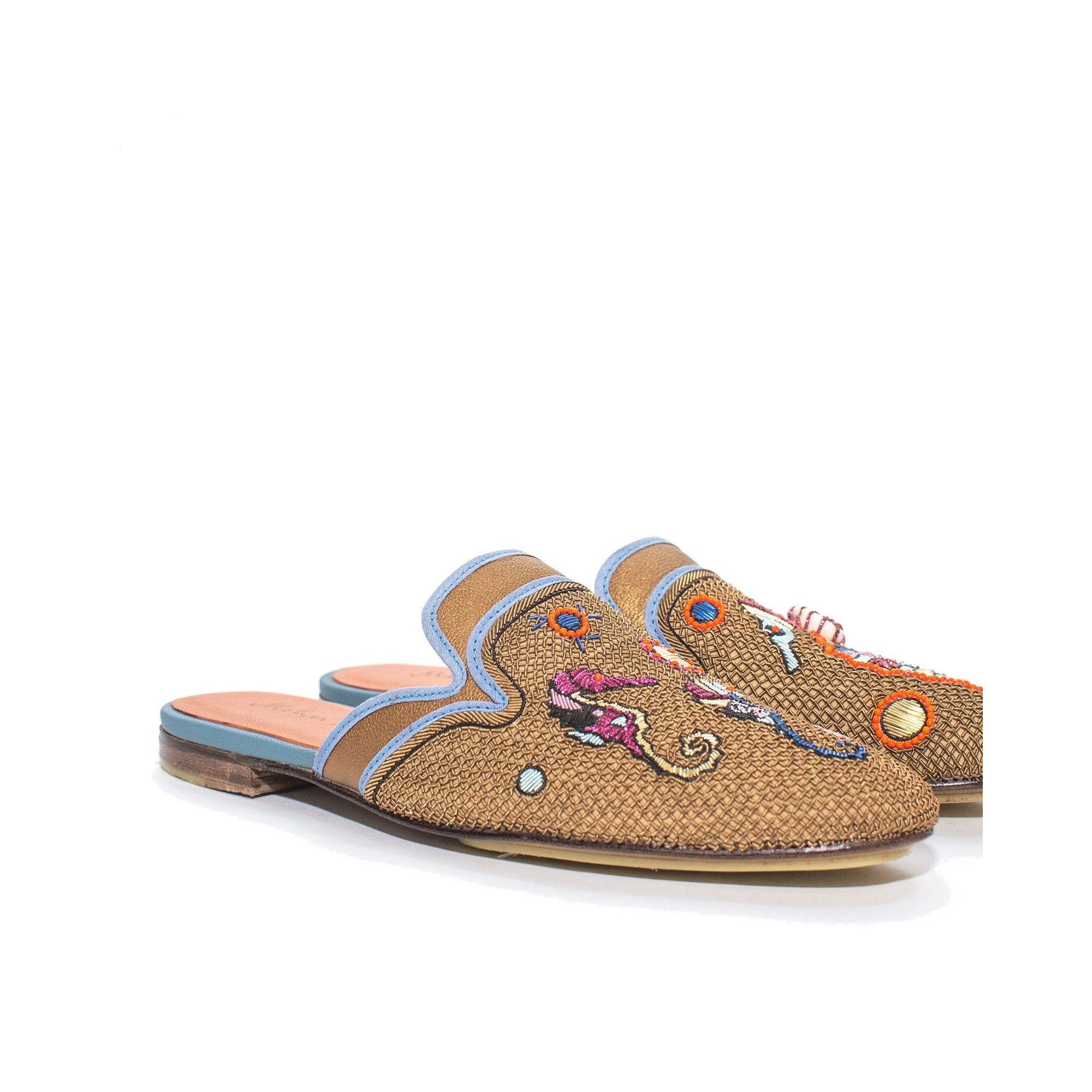 Eco-friendly slippers with sea-inspired embroidery, perfect for resort wear.