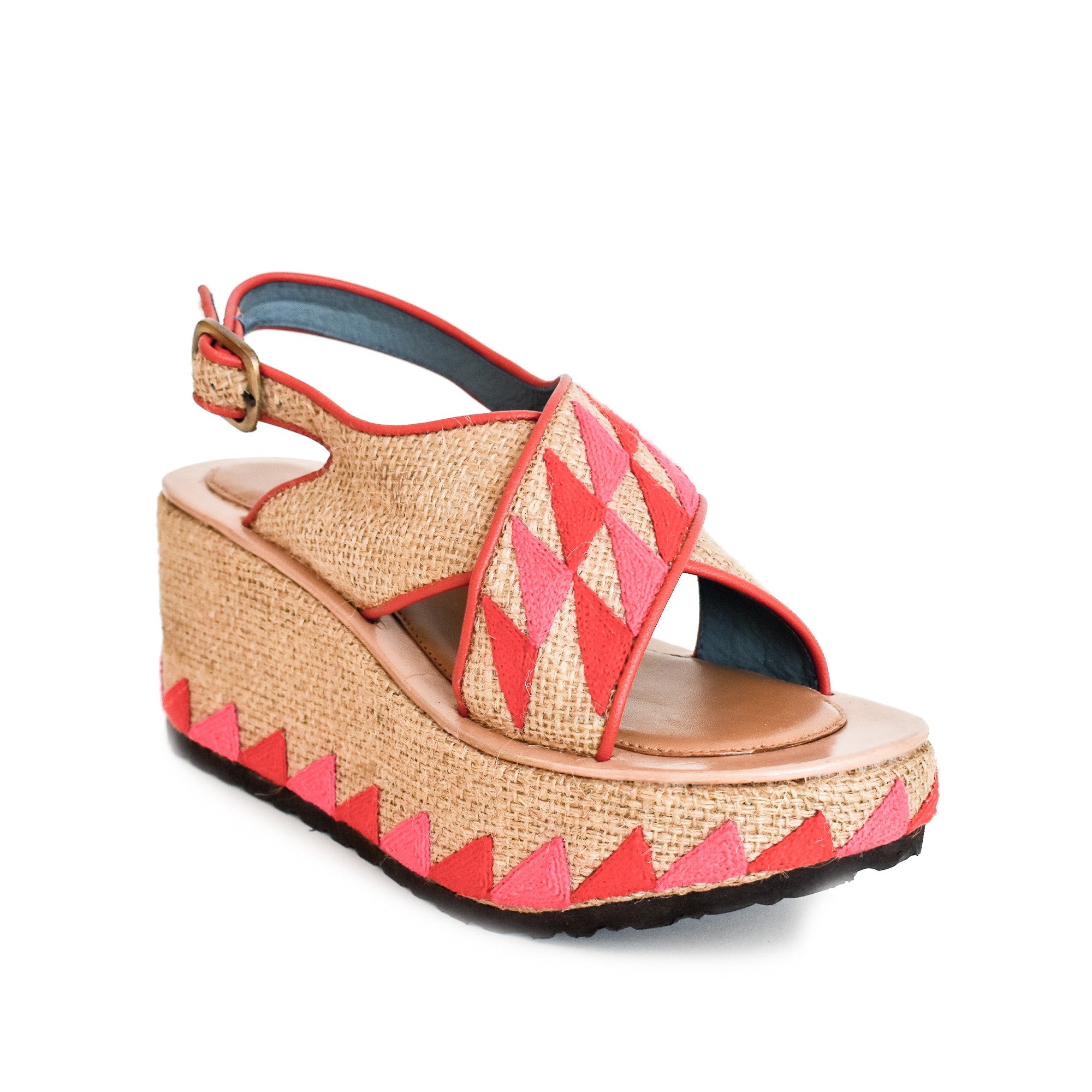 Side view of jute platform wedge with bold pink-red pattern and leather-lined insole.