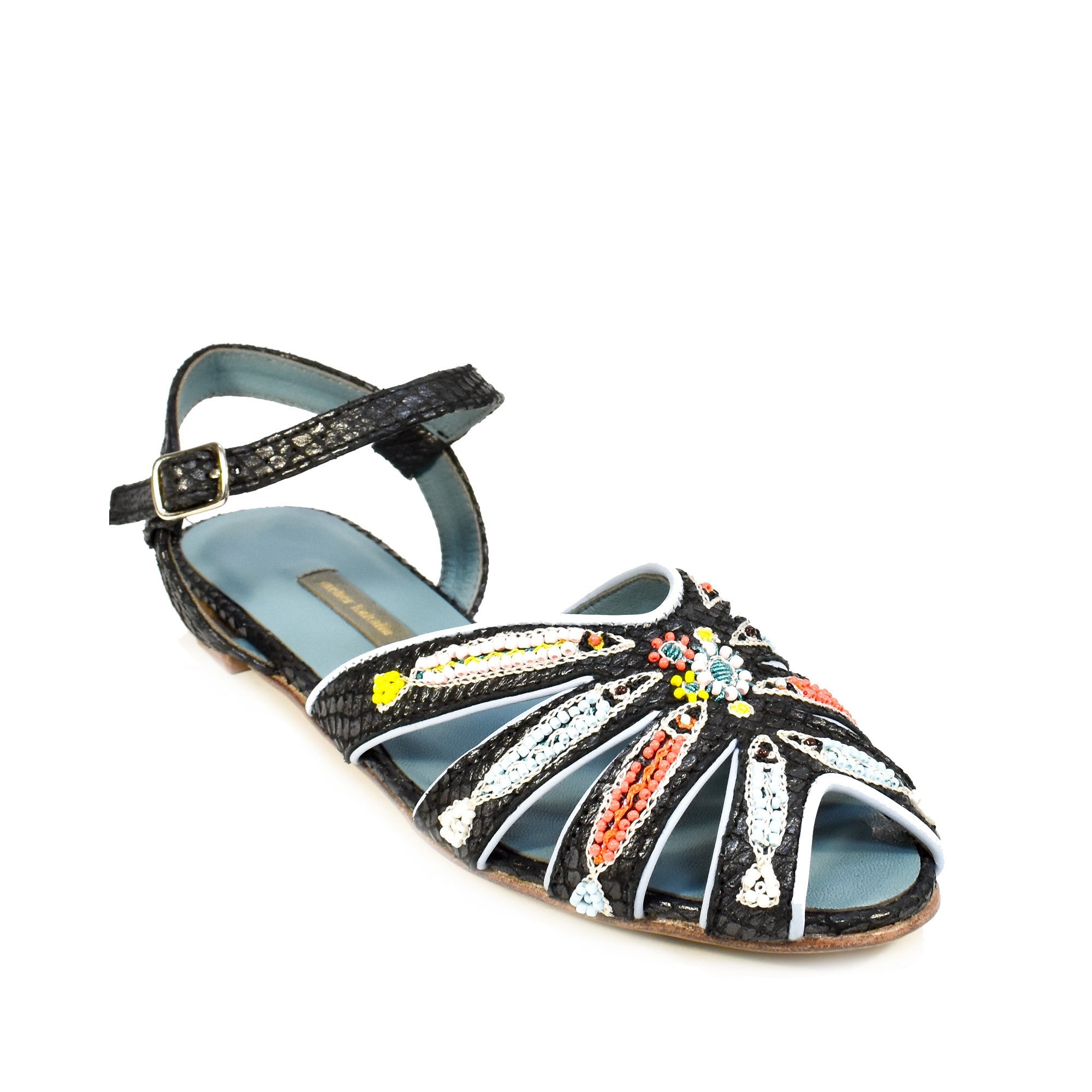 Elegant TAVIRA SANDAL magma black with fish embroidery and sustainable snake-effect leather – ideal for summer getaways.