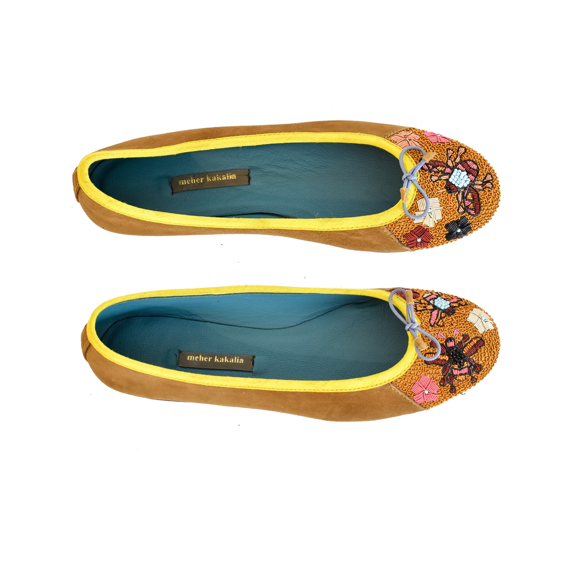 Meher Kakalia Handmade Ballerinas in camel suede with hand-embroidered bee and flower motifs. Luxury ballerinas crafted for comfort and style.