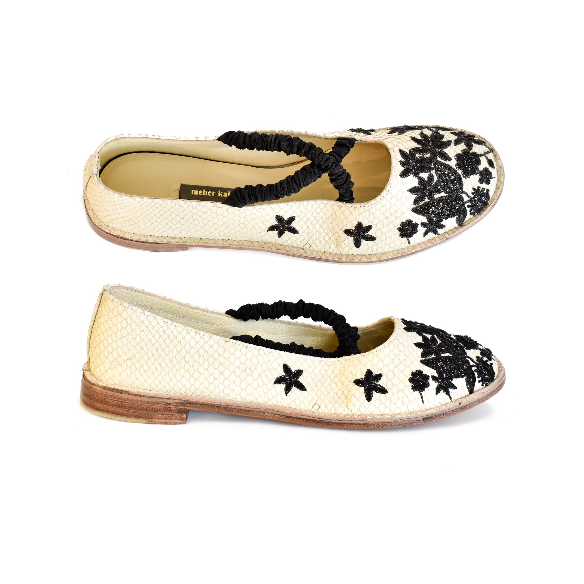 Meher Kakalia Julietta flat by Meher Kakalia, handmade in snake-print leather with monochrome embroidery. Sustainable & stylish flats.