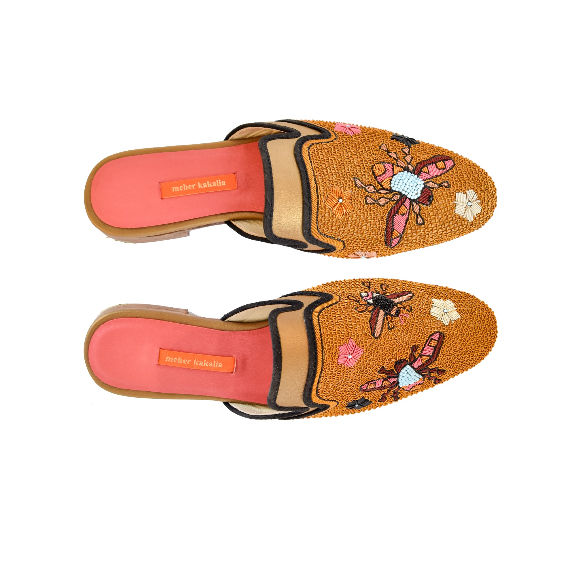 Meher Kakalia Luxury embroidered slippers with floral designs, hand crafted using eco leather and metal coil embroidery.