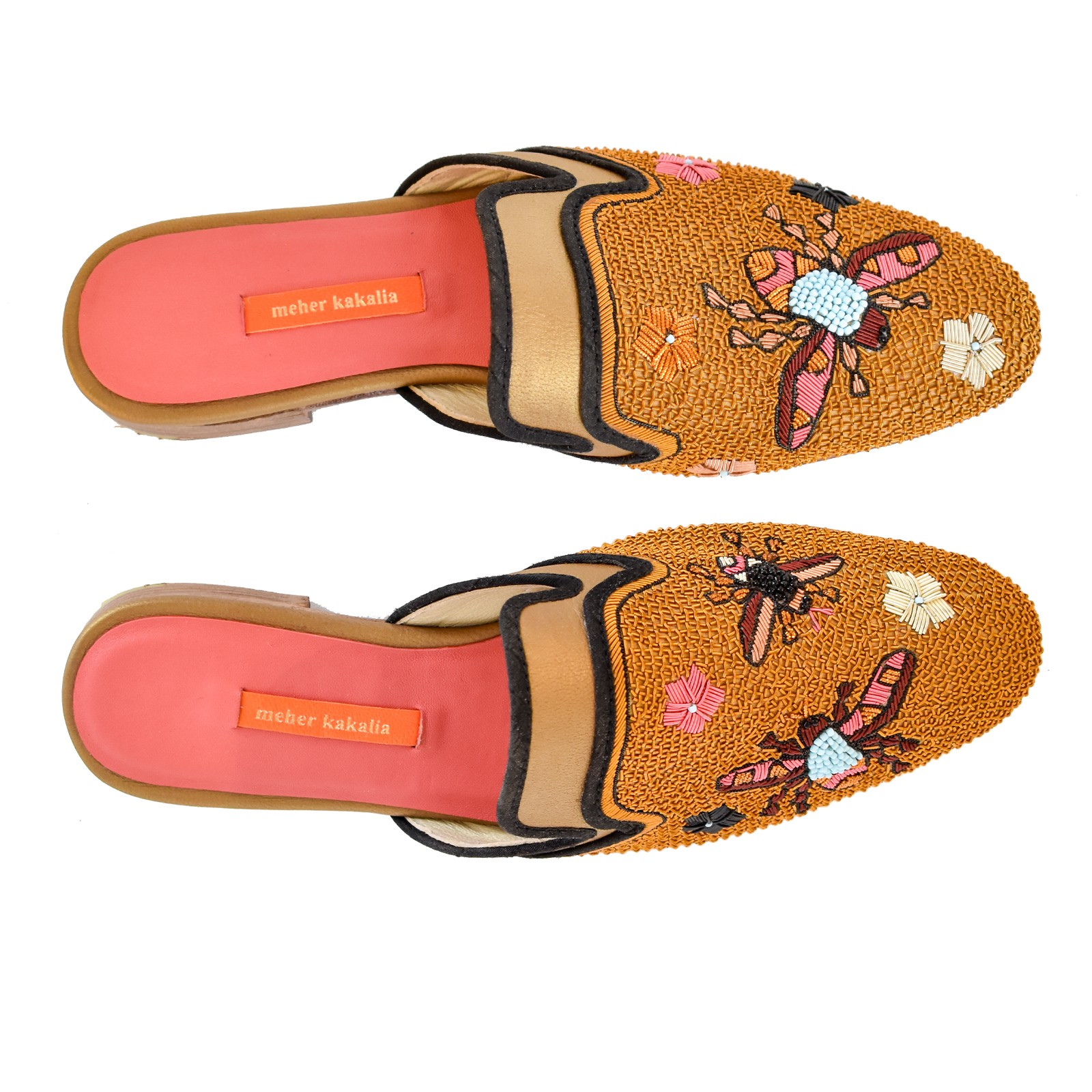 Luxury embroidered slippers with floral designs, hand crafted using eco leather and metal coil embroidery.