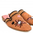 Meher KakaliaSustainable embroidered flats with vibrant floral details, ideal for warm weather and casual outfits.