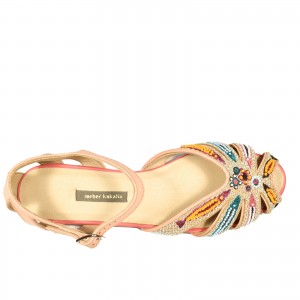 These beautiful sandals feature eco-leather straps and vibrant embroidery, ideal for tropical vacations and beach parties.