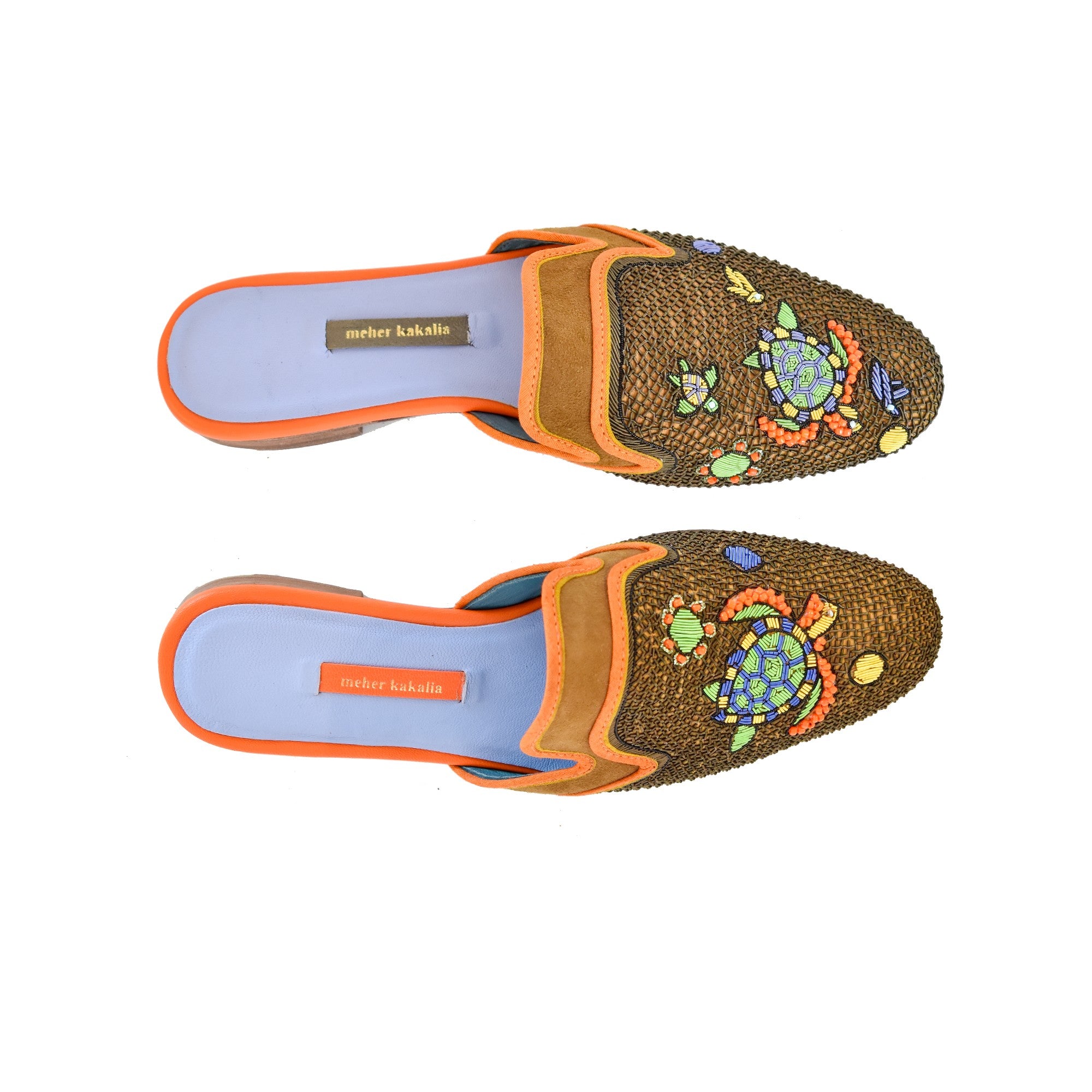 These handmade Darwin Slippers are embroidered with eco leather and turtle motifs. Perfect for sustainable summer holidays.
