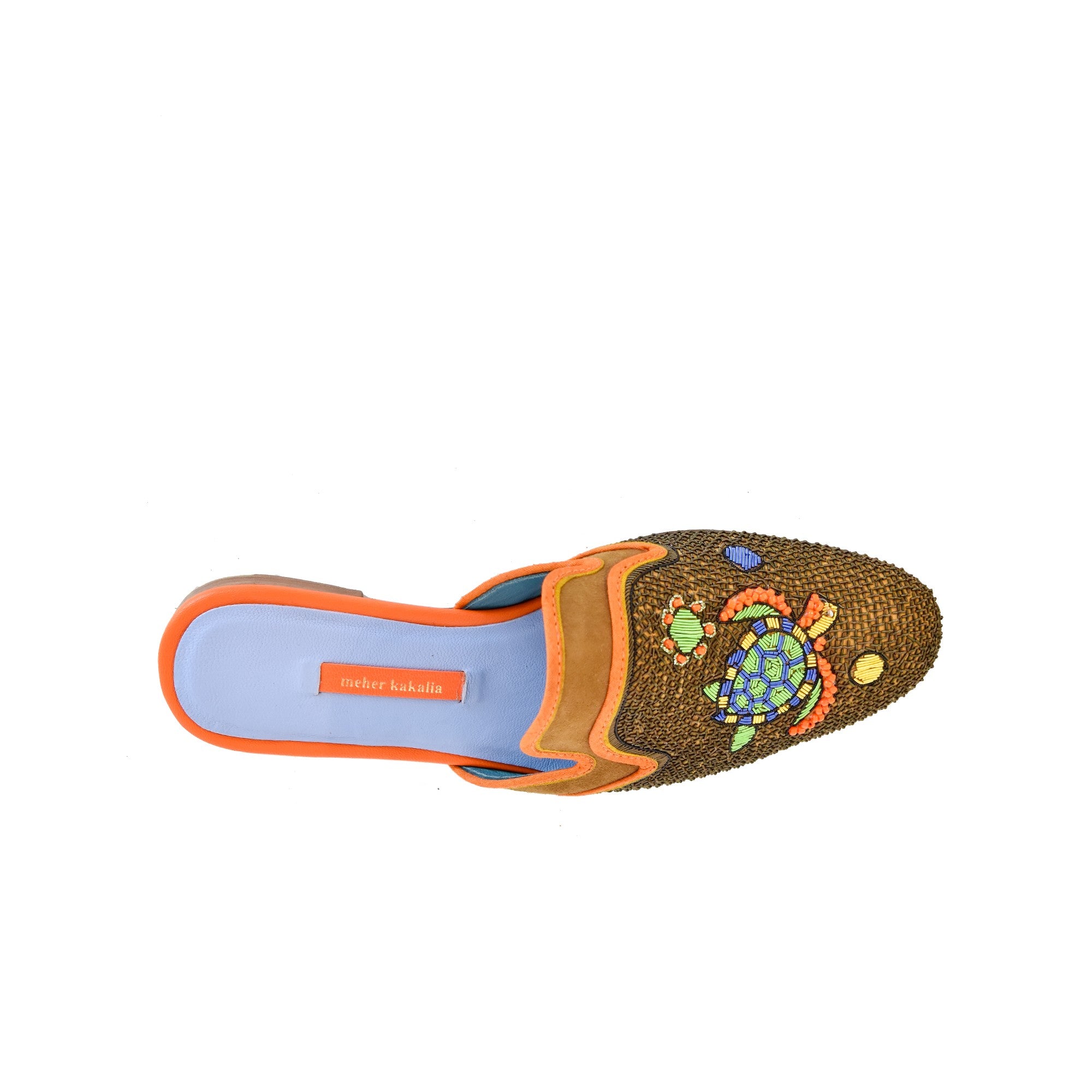 Sustainable Darwin Mules, handmade with embroidery, ideal for summer getaways. Elegant and eco-friendly footwear.