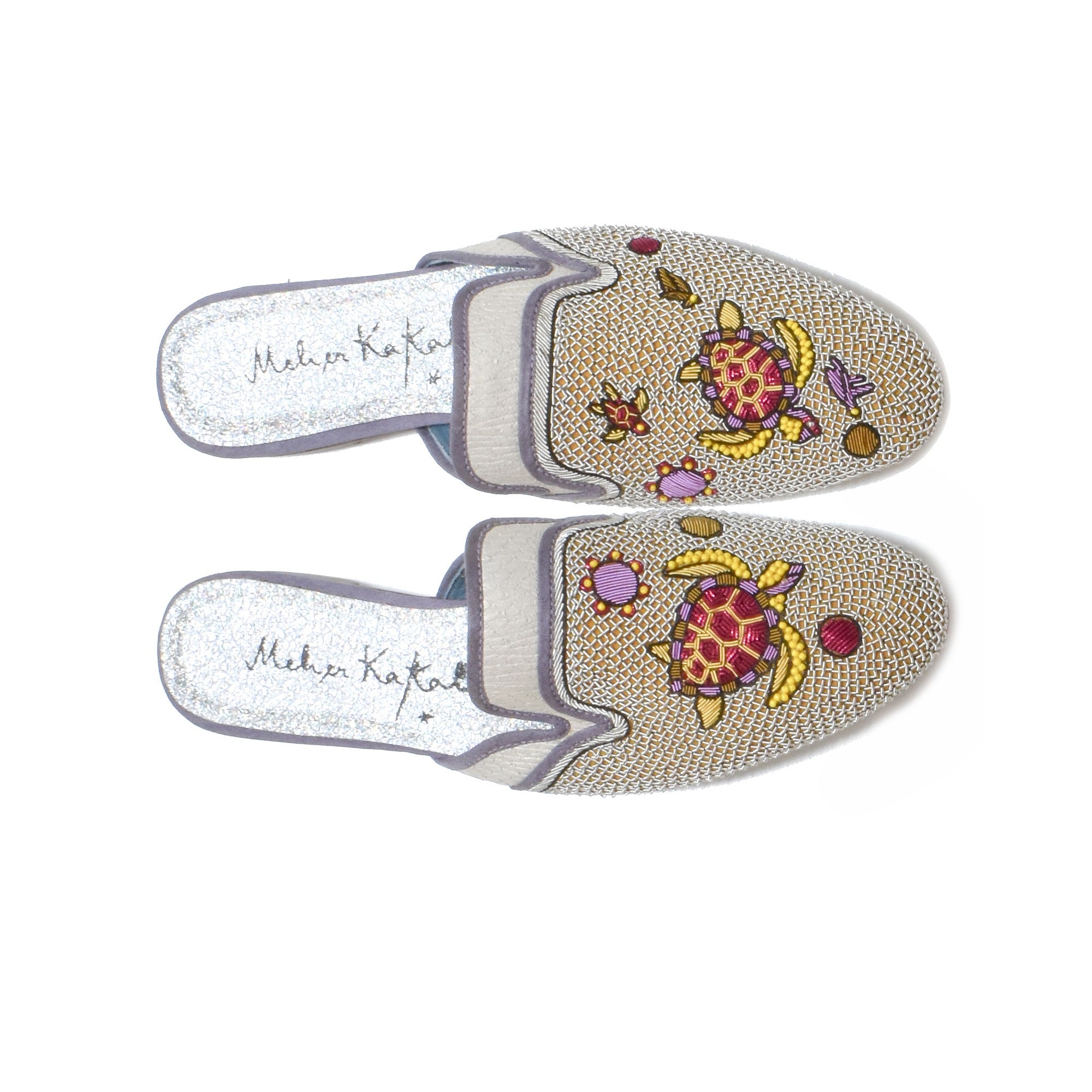 Darwin Slippers by Meher Kakalia in soft eco-leather, hand-embroidered with vibrant turtle motifs, perfect for resort wear.