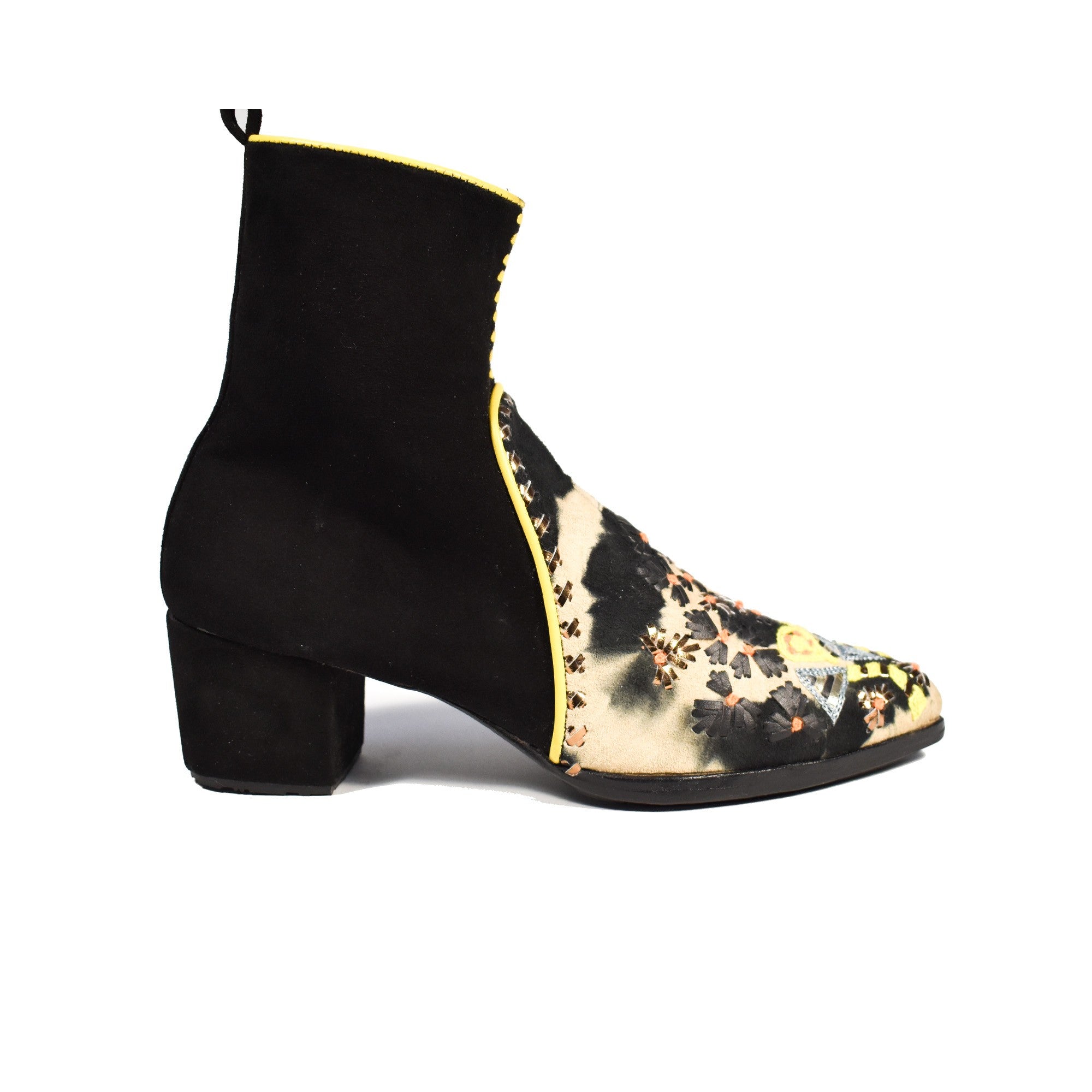 Side view of Mani Point Heel in black suede with tie-dye beige front and yellow piping